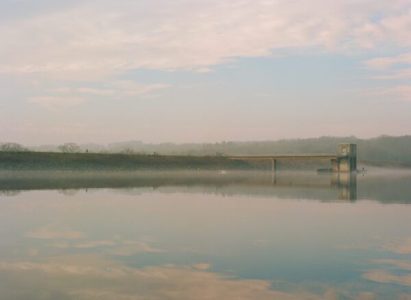 A photograph of haze and fog at the Lake Galena dam.